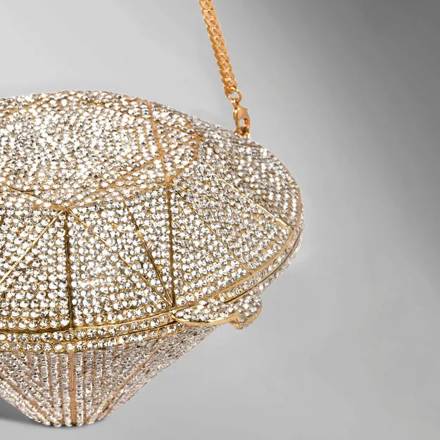 Caprese Enigma Gold Clutch