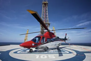 Posterazzi AgustaWestland AW109E helicopter parked on the helipad of an oil rig in the Gulf of Mexico Poster Print, (34 x 22)